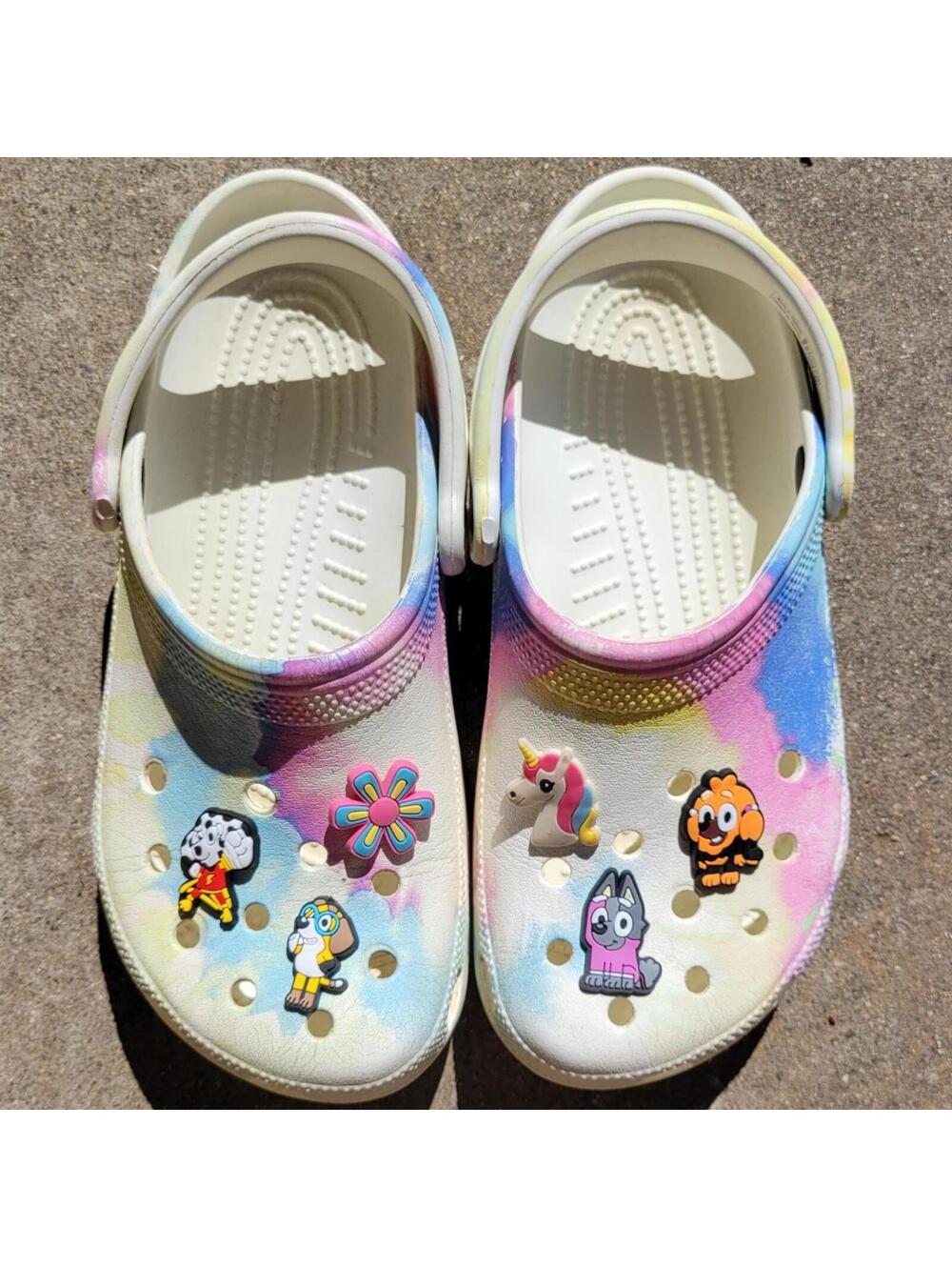 Women's 7, Men’s 5 tie dye rainbow Clogs with clog charms. Pre-owned, good.